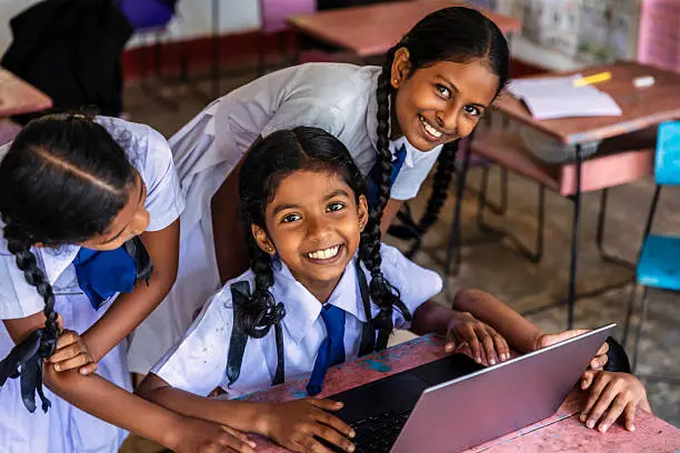 Teacher helping student